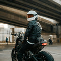 Rider in a black leather motorcycle jacket