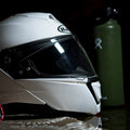 White and black modular flip-up motorcycle helmet