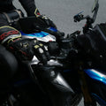 Rider wearing off-road gloves on the handlebars