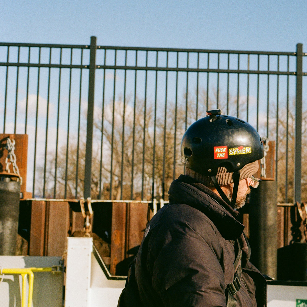 Rider wearing a helmet with a camera mounted on it